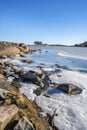 View of the coast and frozen sea in spring, East Port, Hanko, Finland Royalty Free Stock Photo