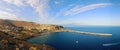 View with coastal buildings, blue water and pier of San Sebastian de la Gomera, Canary Islands Royalty Free Stock Photo