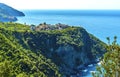 A view from the coastal path over the picturesque cliff top village of Corniglia, Italy Royalty Free Stock Photo