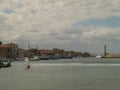 View of the coastline and the bay on which sails the yacht with a white sail, Chania