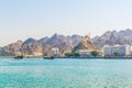 View of coastline of Muttrah dominated by a fort on a hill, Muscat, Oman....IMAGE Royalty Free Stock Photo