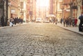 View of cobblestone covered Greene Street with bright sunlight background in the SoHo neighborhood of New York City Royalty Free Stock Photo