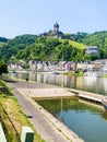 View of Cochem city on Moselle riverbank in summer