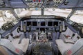 A view of the cockpit of a large commercial airplane a cockpit . Cockpit view of a aircraft cruising Control panel in a plane Royalty Free Stock Photo