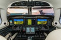 View into the cockpit of a sports plane. Modern Glass cockpit of a turboprop aircraft view of the dashboard