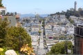 View of Coit Tower on a beautiful sunny day from the top of Lombard Street