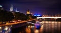 View of Cologne Dom Cathedral and Great St Martin Church at night from the chocolate museum, Germany Royalty Free Stock Photo