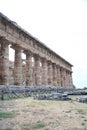 View of the colonnade and lateral entablature of the temple of Neptune, excavations of Paestum, Cilento, Campania, Italy Royalty Free Stock Photo