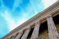 View of Colonnade of the Pantheon against the blue sky. Ruins of Ancient Rome. Royalty Free Stock Photo