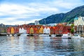 View on color facade of houses and mountain