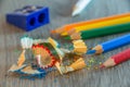 View of colored school pencils on the table, sharpeners and shavings Royalty Free Stock Photo