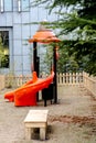 Colorful children`s slide in a kid garden Royalty Free Stock Photo