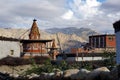 Upper Mustang. Nepal. View of the colorful chorten and the Buddhist monastery in the Tsarang village. Royalty Free Stock Photo