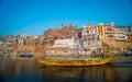 View of the colorful holy Indian city with Ganges river ghat in Varanasi.India