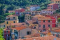 View of the colorful houses along the main street in a sunny day in Riomaggiore. Royalty Free Stock Photo