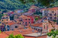 View of the colorful houses along the main street in a sunny day in Riomaggiore. Royalty Free Stock Photo