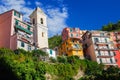 View of the colorful houses along the main street in a sunny day in Riomaggiore. Royalty Free Stock Photo