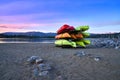 View of colorful kayaks on sandy beach at marina on Lake Dillon in Frisco Colorado