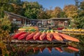 View of colorful kayaks on the shore of the lake