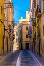 view of a colorful narrow street in the historical center of spanish city tarragona...IMAGE Royalty Free Stock Photo