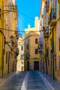 view of a colorful narrow street in the historical center of spanish city tarragona...IMAGE Royalty Free Stock Photo