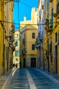 view of a colorful narrow street in the historical center of spanish city tarragona...IMAGE Royalty Free Stock Photo