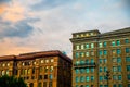 Sunset over old brick city apartment buildings