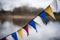 View of colorful triangular festival flags in blurred background Royalty Free Stock Photo