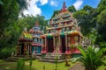 view of colorful and vibrant hindu temple, surrounded by greenery