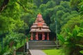 view of colorful and vibrant hindu temple, surrounded by greenery