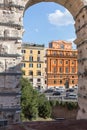 View from the Colosseum to inner-city buildings Royalty Free Stock Photo