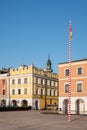 View of colourful renaissance buildings in the historic Great Market Square in Zamosc in southeast Poland.