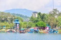 Colourful Tourists Rowboats Docked on Phewa Lake