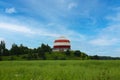 View of the communications tower building in the forest Royalty Free Stock Photo