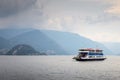 View of the Como Lake with ferry boat, italy