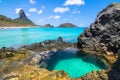 Conceicao Beach and Galego hole in Fernando de Noronha Island Brazil with Peak Hill (Morro do Pico)