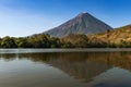 View of the Concepcion Volcano and its reflection on the water in the Ometepe Island, Nicaragua Royalty Free Stock Photo