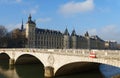 View of Conciergerie Castle and Bridge of Change over river Seine. Paris, France Royalty Free Stock Photo