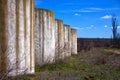 View of the concrete columns of the building, against the backdrop of architecture. concrete columns. Vertical