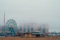 View of Coney Island amusement park on a foggy day, New York, United Sates