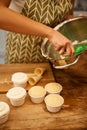 View of confectioner mixing cream for