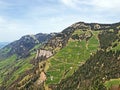 A view of the coniferous forests and pastures on the slopes of Rigi mountain Royalty Free Stock Photo