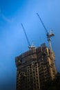 View of construction of multi-storey residential building. Condo Royalty Free Stock Photo