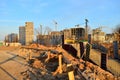 View of the construction site with cranes, concrete formwork in the pit in the construction of an underground passage Royalty Free Stock Photo