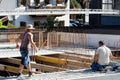 View of the construction site in a residential area where builders work