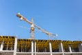 View of construction site. tower cranes against blue sky background Royalty Free Stock Photo