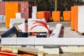 View of the construction site, waterproofed foundations and delivered building materials Royalty Free Stock Photo