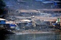 View from container terminal on shanty town in Freetown in Sierra Leone. Royalty Free Stock Photo