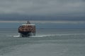 View on container vessel from other ship underway approaching the port of Vancouver, Canada. Royalty Free Stock Photo