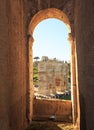 View of Arch of Constantine, framed with a stone arch of the Colosseum in Rome Royalty Free Stock Photo